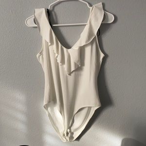 White body suit. Size medium
